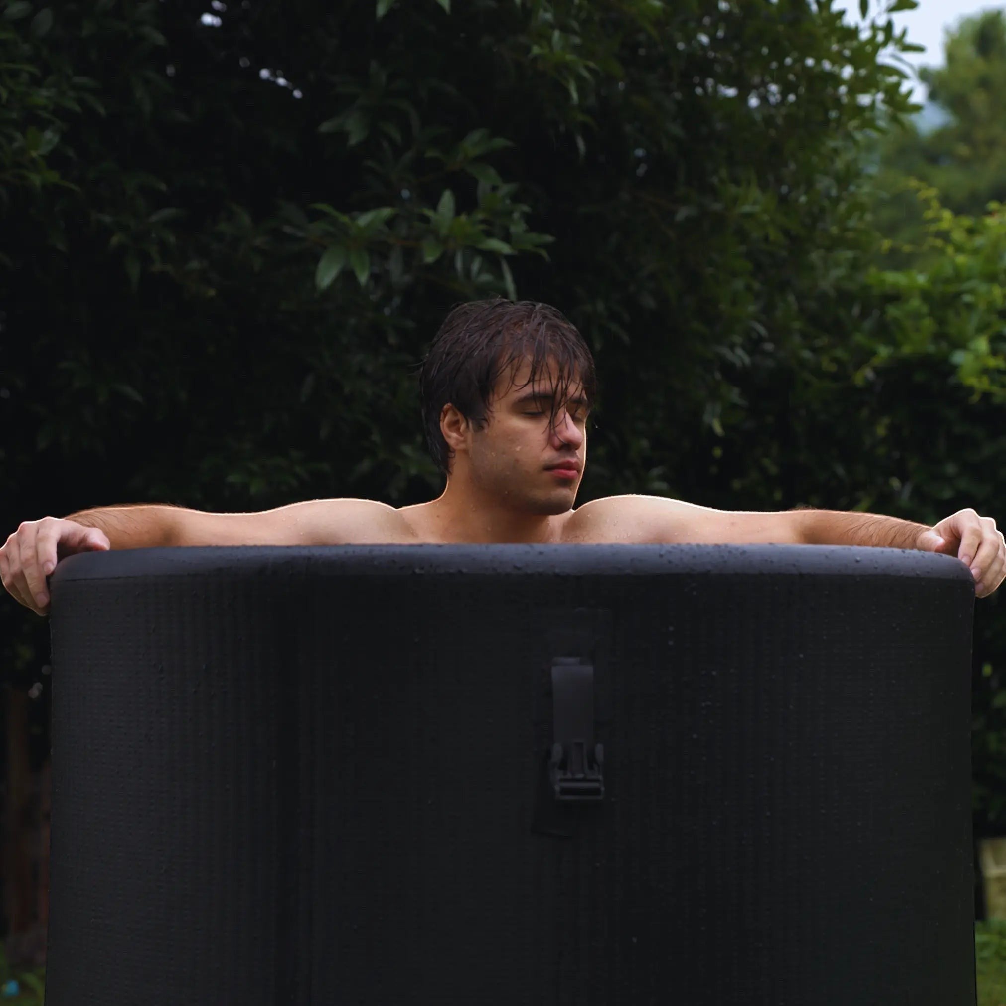 Garvnive Black Inflatable Ice Bath Tub with Buckle Details, suitable for indoor and outdoor use.
